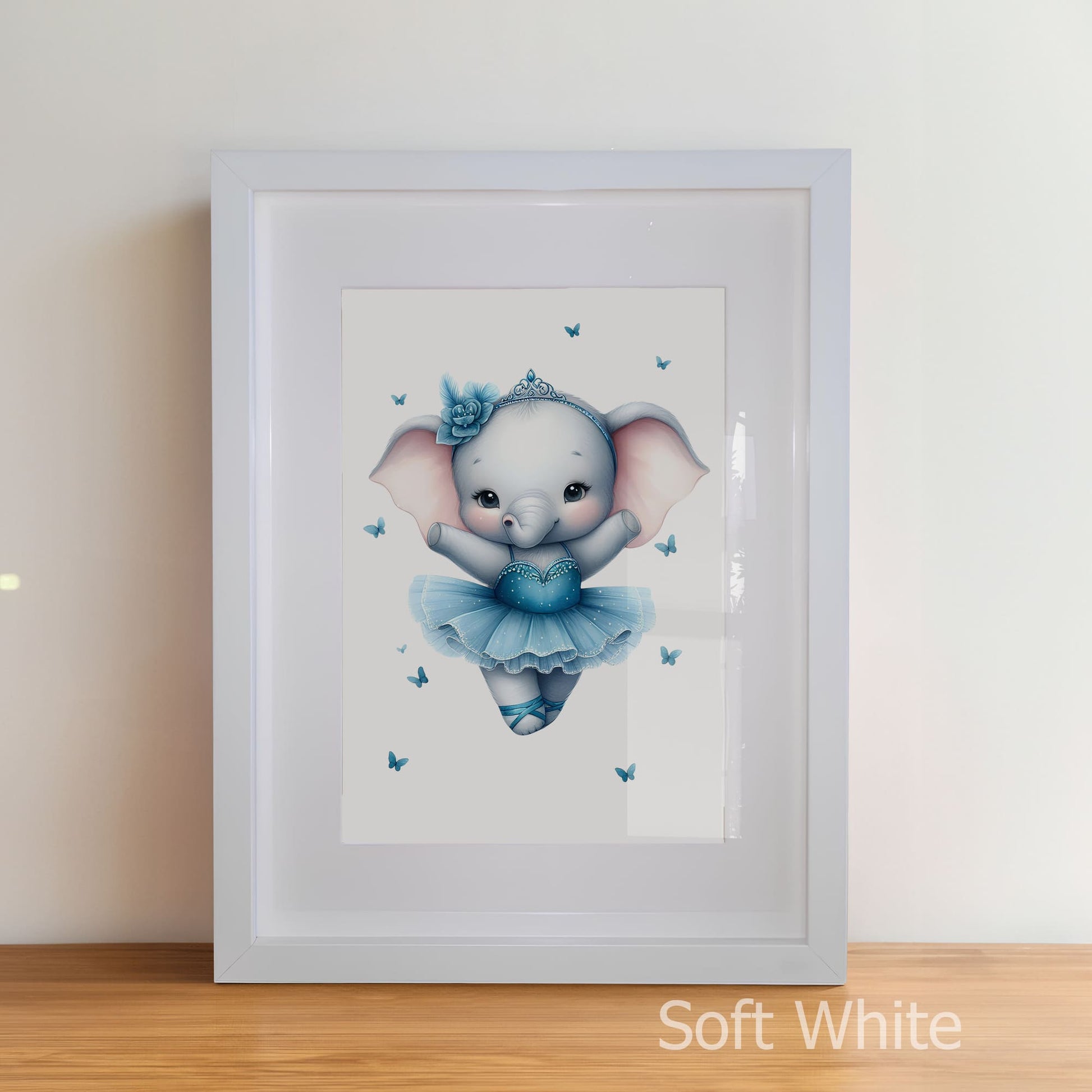 Framed artwork of a cartoon elephant in a ballet outfit with butterflies on a white background.