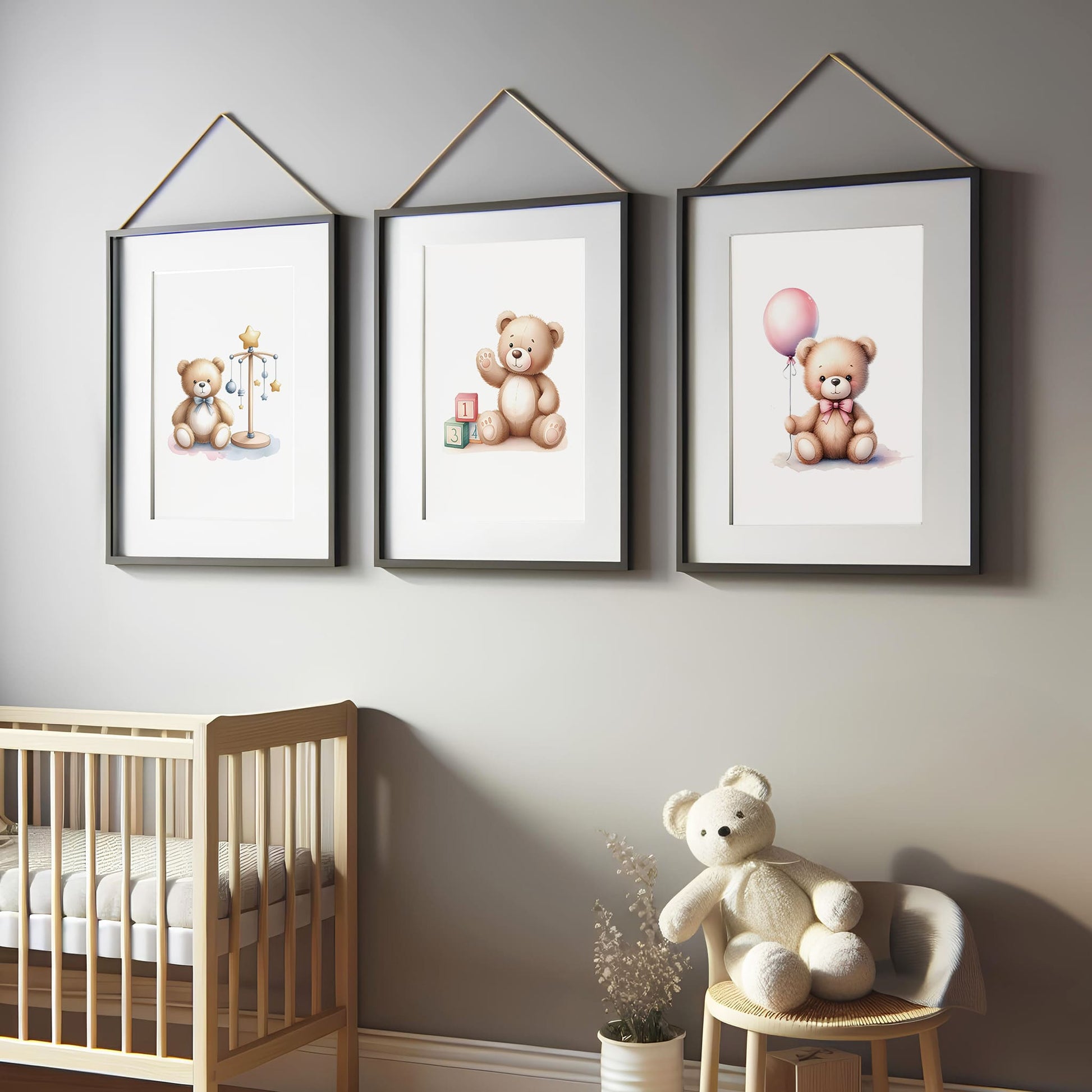 Set of three A4 prints in watercolour style. Each print depicts a teddy bear in a different scene: one teddy bear is holding a balloon, another is surrounded by counting blocks, and the third is near a mobile.