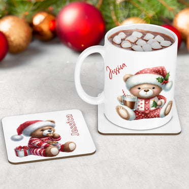 Christmas Mug & Coaster set featuring teddy bears in christmas pyjamas drinking hot chocolate and cookies. Personalised with childs name
