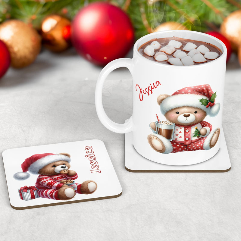 Christmas Mug & Coaster set featuring teddy bears in christmas pyjamas drinking hot chocolate and cookies. Personalised with childs name