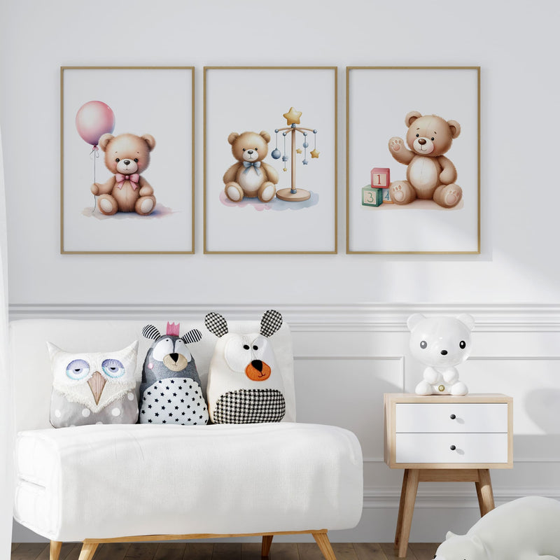 Set of three A4 prints in watercolour style. Each print depicts a teddy bear in a different scene: one teddy bear is holding a balloon, another is surrounded by counting blocks, and the third is near a mobile.