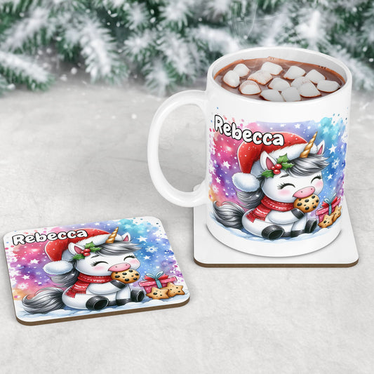 Childrens Christmas Mug & Coaster set. Bright colourful background with a unicorn in a santa hat, eating cookies