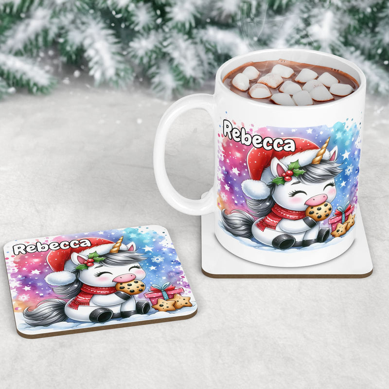 Childrens Christmas Mug & Coaster set. Bright colourful background with a unicorn in a santa hat, eating cookies