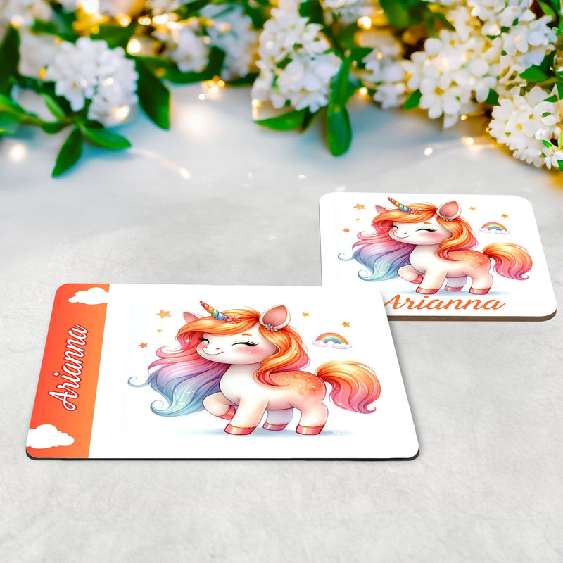 Vibrant warm tones unicorn design on a white placemat and coaster set. All items personalised with childs name in orange