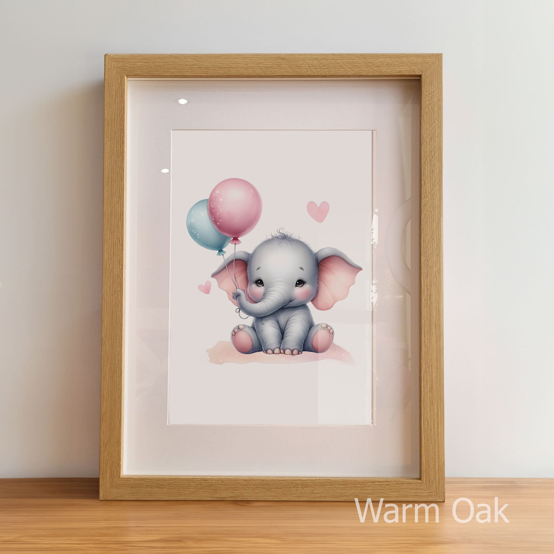 Framed artwork of a cartoon elephant with balloons on a light background
