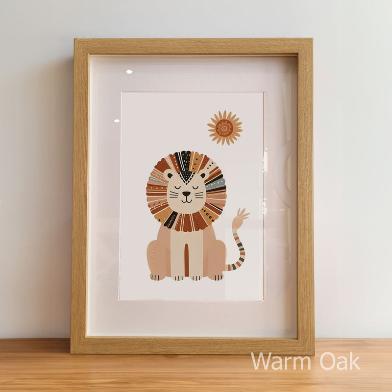 Framed illustration of a lion with a sun on a white background, displayed on a wooden floor.
