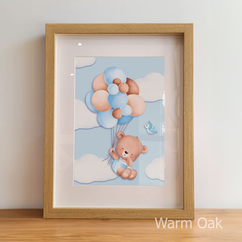 Framed artwork of a bear with balloons on a light background