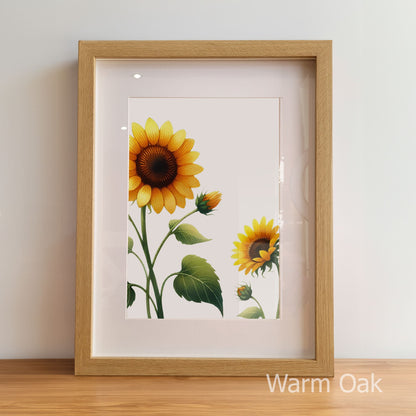 Framed artwork of sunflowers with a warm oak frame on a light background