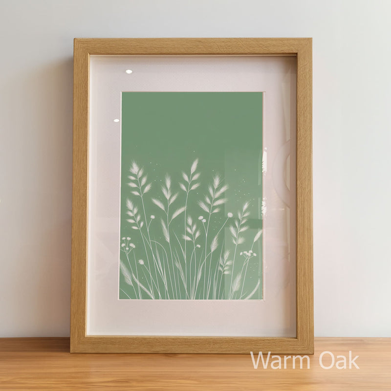 Framed artwork with a green plant design on a light background