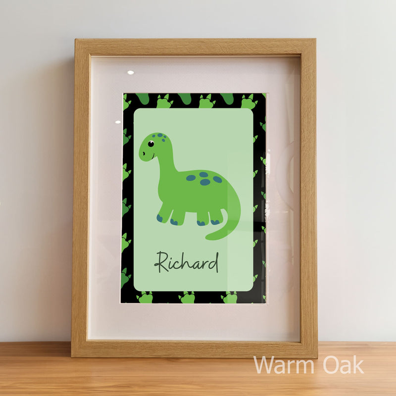 Framed artwork with a green dinosaur illustration and name 'Richard' on a light green background.