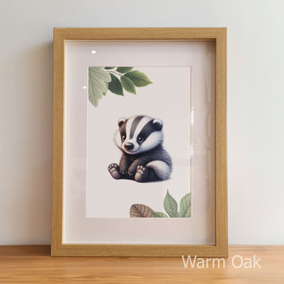Framed artwork of a badger with leaves on a white background