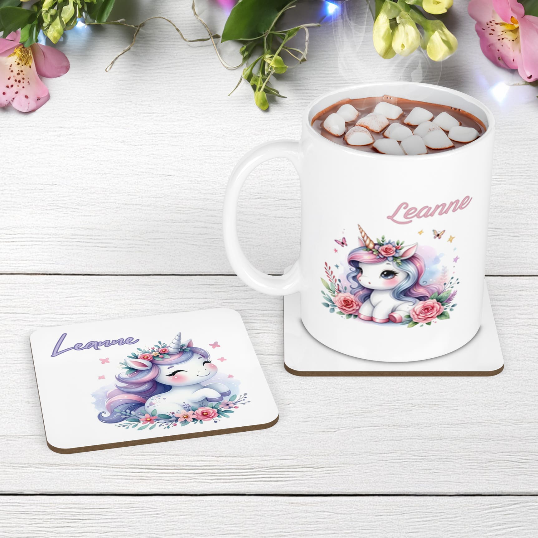 Whimsical flowery unicorn designs in lilacs and pinks on a white mug and coaster set. Personalised with your childs name