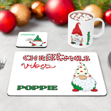 Childrens table wear set of 3 - mug, coaster and placemat featuring vibrant fun christmas gonk design on a white background. Personalised with childs name