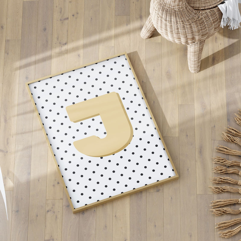 3 boho style nursery prints in shades of yellow. One print with a boho yellow rainbow, one with a spotty black and white background, and childs initial, one with daisys and childs name