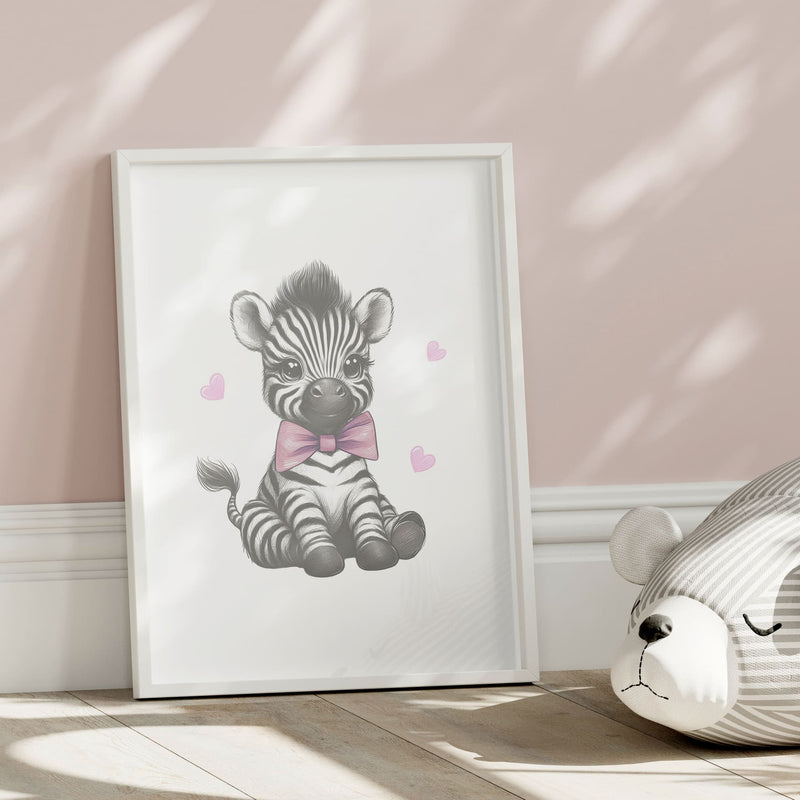 Set of three A4 prints in the style of pencil drawings. Each print features a cartoon baby giraffe, baby elephant, and baby zebra in black and white. They all wear a pink bow, with a few small pink hearts in the background. The middle image contains the elephant, which is smaller than the other two images. In the background, there is a large initial with a personalised name in black.