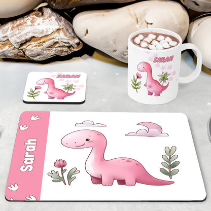 White Placemat, Mug and Coaster Set with Cute friendly pink dinosaur , flower and dinosaur prints. Personalised with Childs name